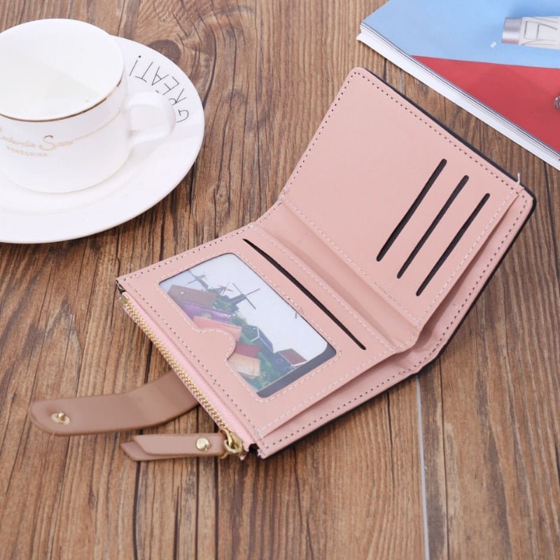 Cartera con estampado hojas