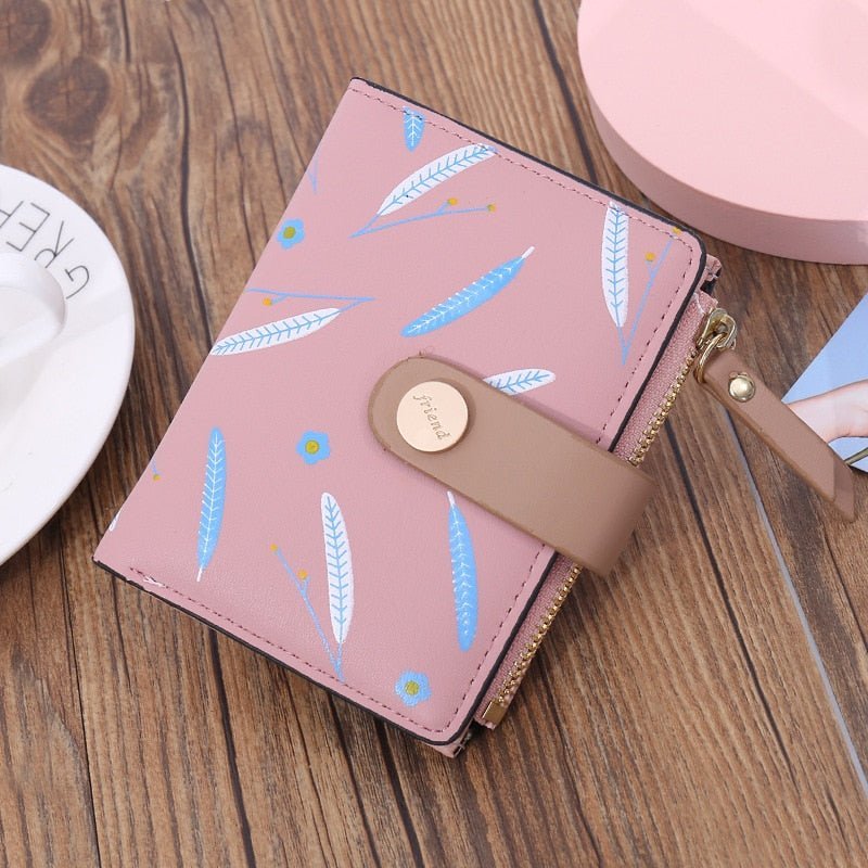 Cartera con estampado hojas