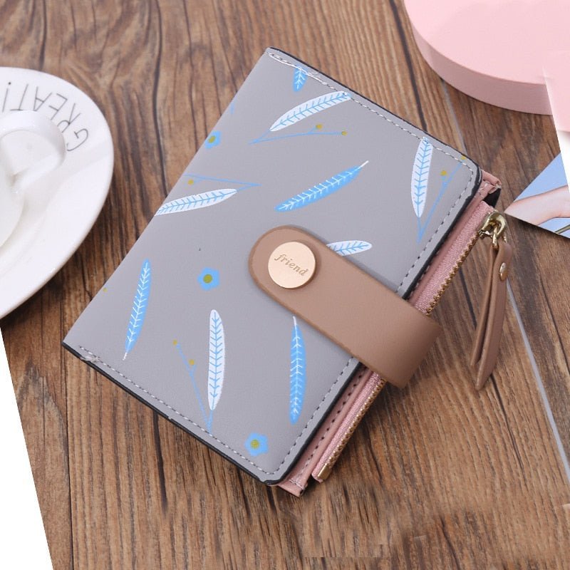 Cartera con estampado hojas