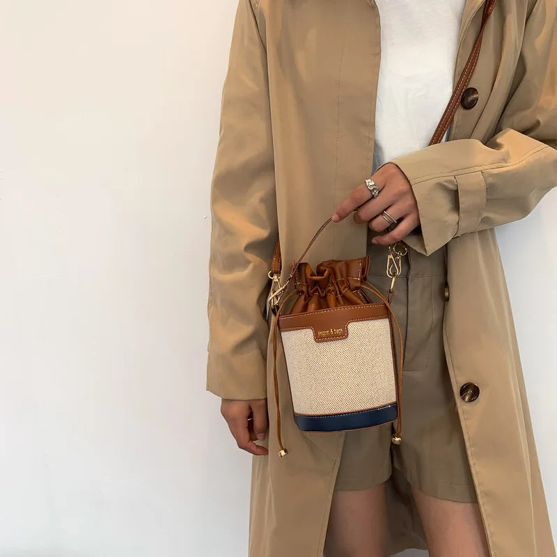 Bolso en forma de cilindro