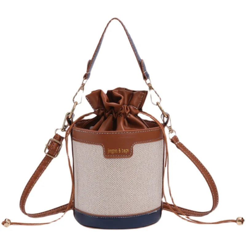 Bolso en forma de cilindro
