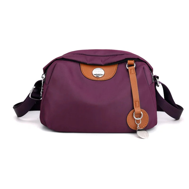 Bolso cruzado impermeable de nailon Morado as picture