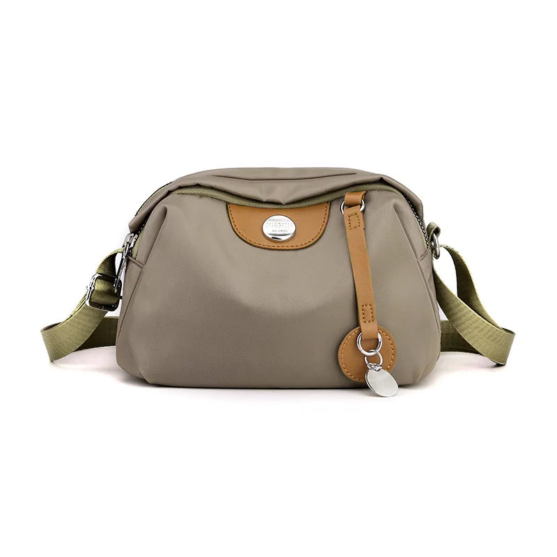 Bolso cruzado impermeable de nailon Caqui as picture