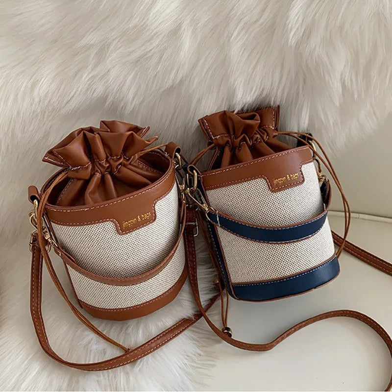 Bolso en forma de cilindro