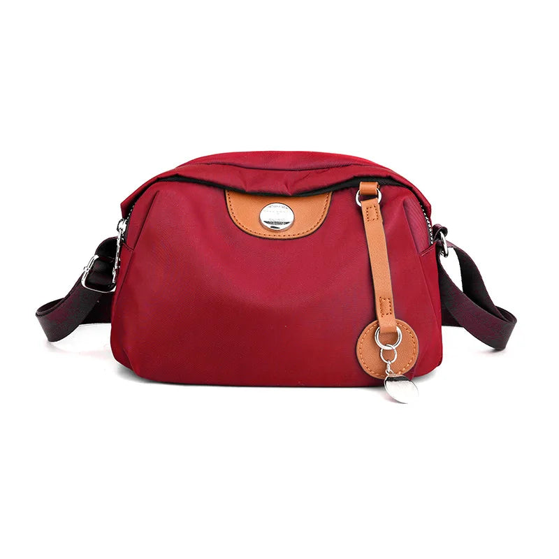 Bolso cruzado impermeable de nailon Rojo as picture