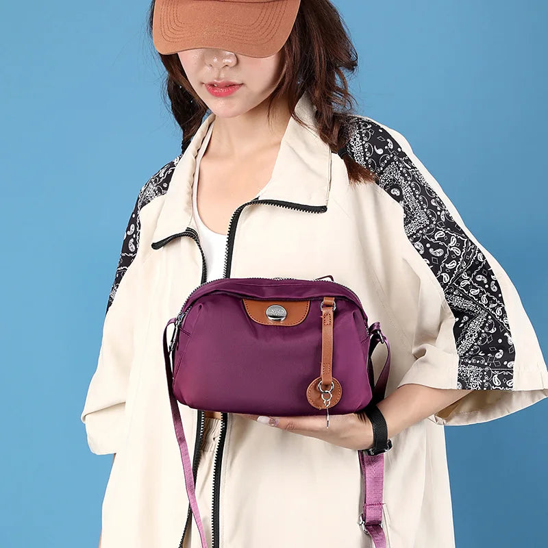 Bolso cruzado impermeable de nailon