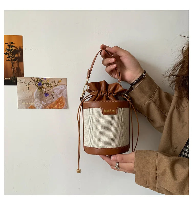 Bolso en forma de cilindro