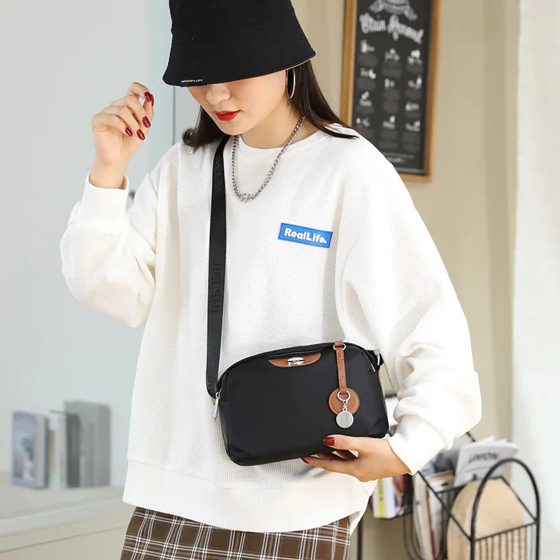 Bolso cruzado impermeable de nailon